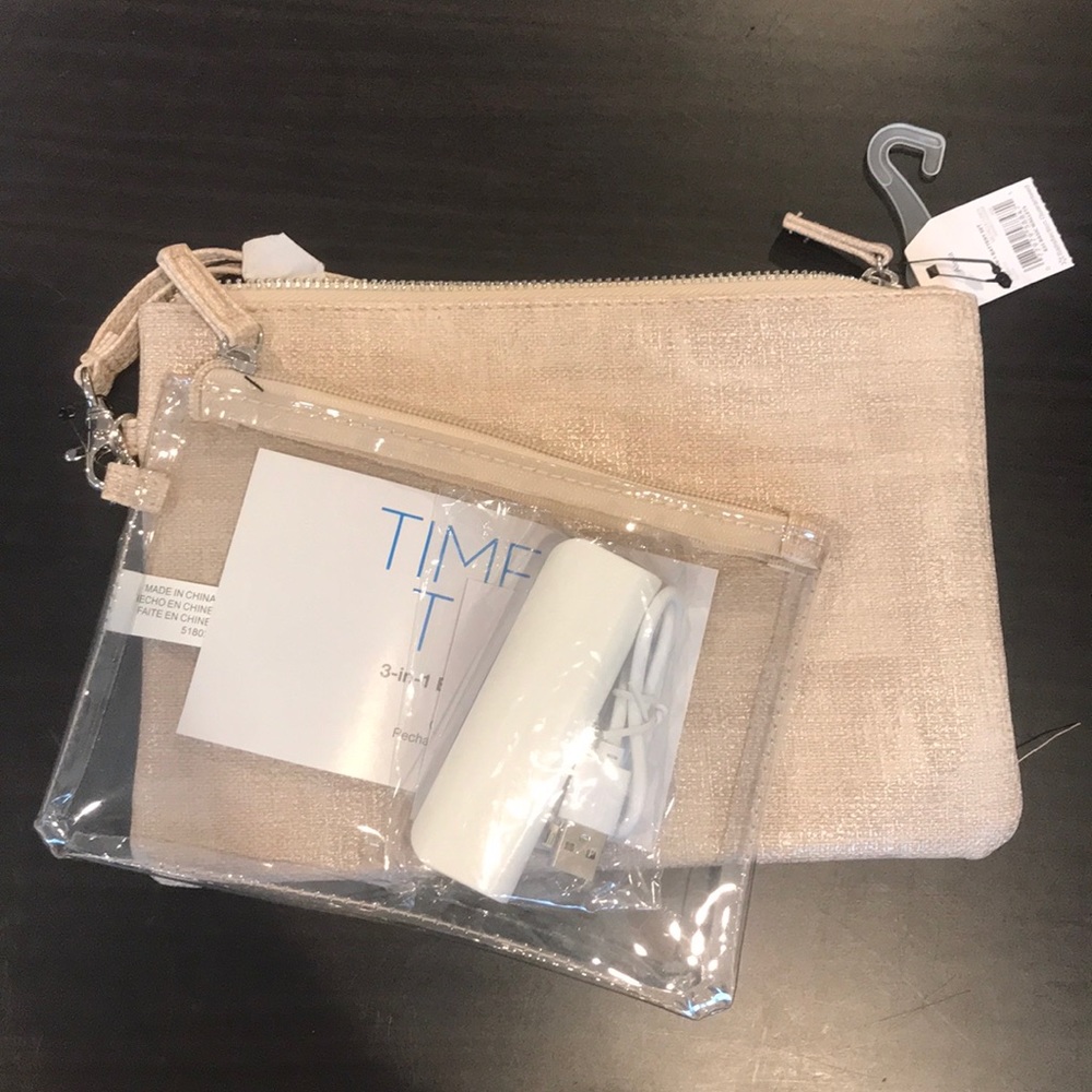NWT Cream colored clutch with rechargeable battery